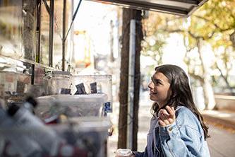 image of Ruthie Freer speaking with food truck operators. 